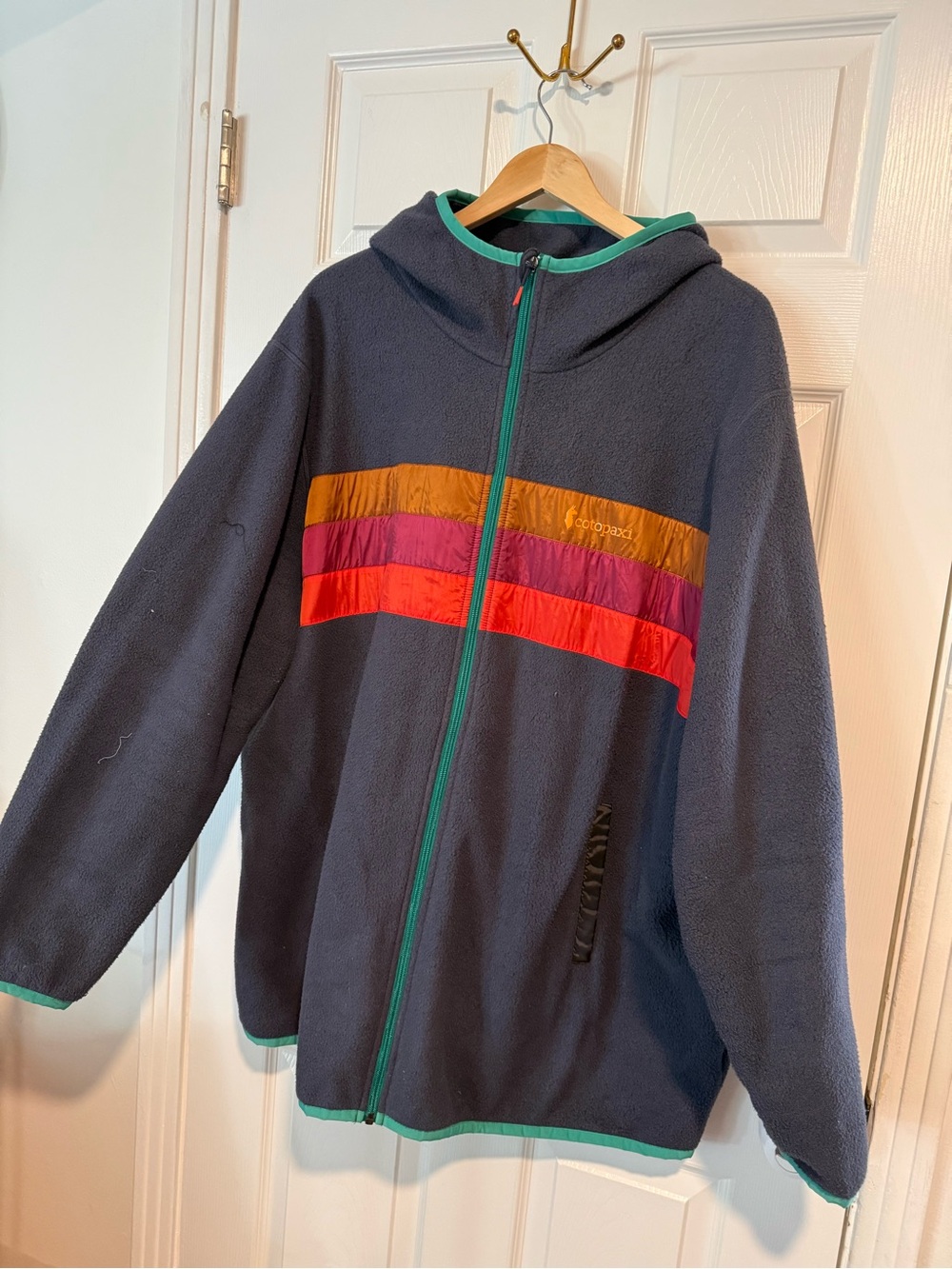 cotopaxi Navy Hooded Fleece with Orange, Pink and Red Stripes